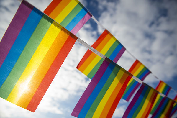 Gay pride rainbow flag bunting in the sky  