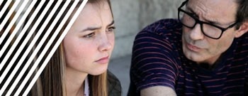 Teen girl and parent in discussion