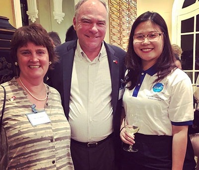 Tran Hoang Huyen Tram, 2017–2018 NIDA Humphrey fellow from Vietnam (right) talks with Anne Holton and Senator Tim Kaine of Virginia during the senator’s visit to Hanoi with a congressional delegation.