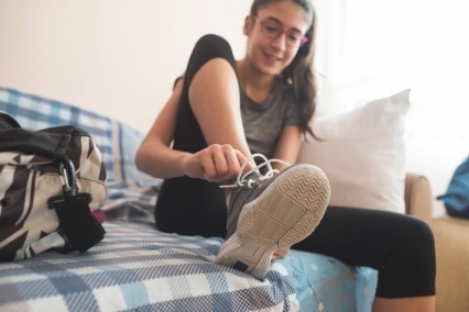 Teenage girl getting ready to workout.