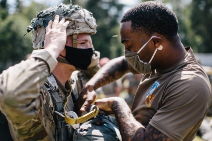 U.S. Army paratroopers assigned to the 173rd Airborne Brigade conduct inspections .