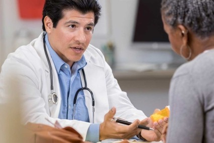 A doctor and patient talking
