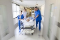 Image of patient on stretcher in emergency setting