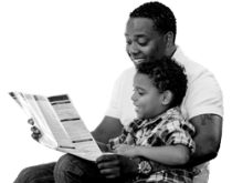 Mixed Race Father and Son Reading Park Brochure Outside