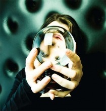 Male holding a crystal ball