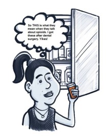 Girl holding a pill bottle in front of a medicine cabinet.