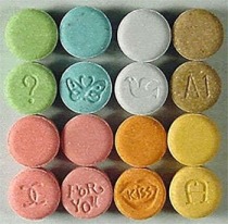 MDMA tablets in various colors.