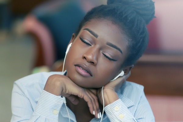 Image of teen girl listening to music