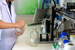 scientist preparing a sample of marijuana for research